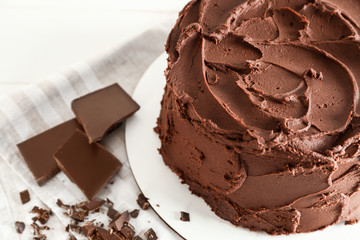 Tasty chocolate cake on stand, closeup