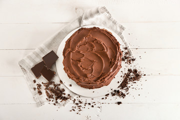Tasty chocolate cake on white background