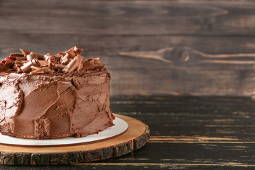 Tasty chocolate cake on table