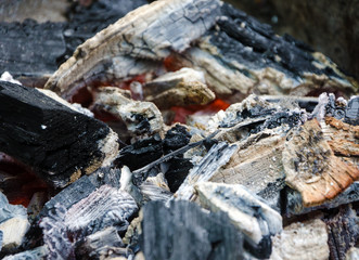 fire with firewood and hot coals
