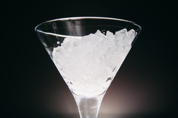 Martini glass full of ice