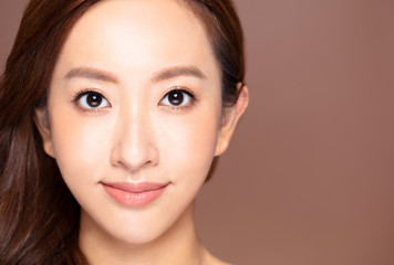 Obraz premium closeup young woman face with makeup and clean skin