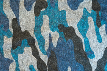 Blue black camouflage fabric texture background