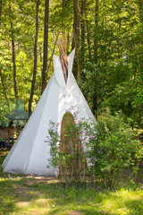 West culture, wigwam, camping, countyside, tourism, travel concept
