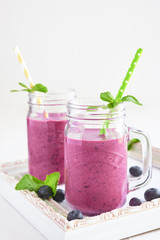 Blueberry smoothy in jar. Text concept. Copy space.