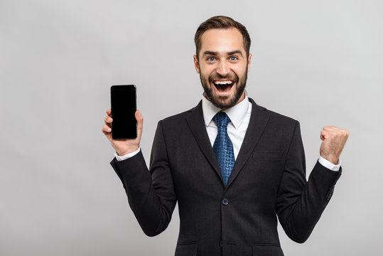 Attractive young businessman wearing suit