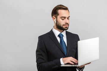 Attractive young businessman wearing suit