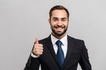 Attractive young businessman wearing suit
