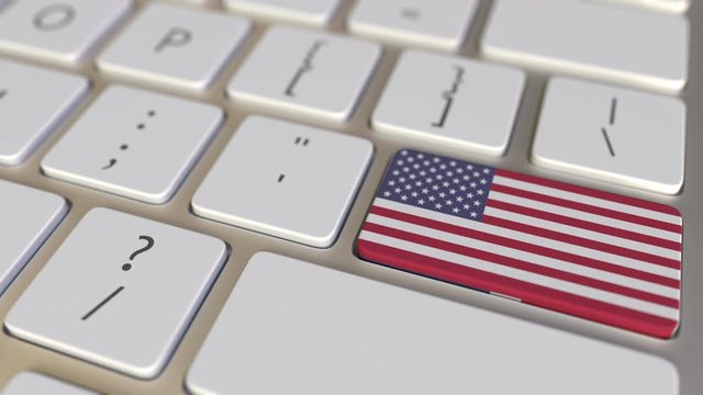 Key with flag of the Dominican Republic on the computer keyboard switches to key with flag of the USA, translation or relocation related animation