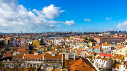 Fototapeta na wymiar Blue sky with clouds over the centre of Lisbon