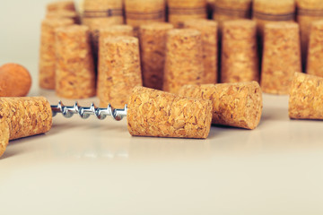 corkscrew for open wine cork bottle on wooden background