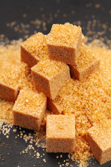 Rock sugar on dark background close up