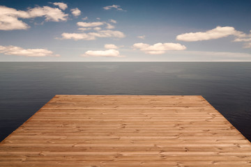  Pier in a sea under cloudy sky