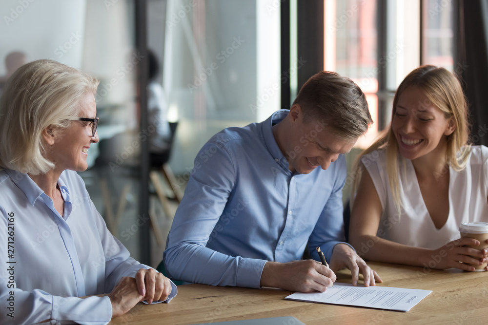 Poster confident businessman signing contract with partners, successful deal concept