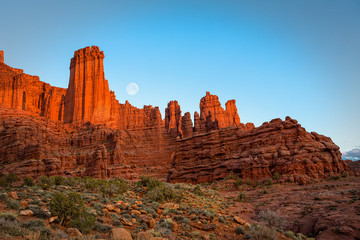 Moon rise at sunset on Fisher Towers near Moab, Utah.