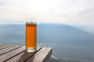 Beer on mountain view. table