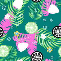 Tropical leaves and fruits exotic seamless pattern.Fruit pattern with lemon and lime, ice cubes and mint leaves on a blue background. Cold cocktail with lemon.