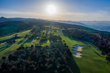 Aerial view of the green golf course in Tbilisi. Georgia. Bird's-eye.