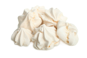Many white crispy fresh meringues