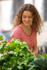 Young woman at the vegetable  food market 