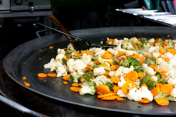 Street food. Carrots, broccoli, cauliflower