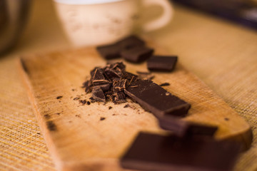 Cut chocolate on the wooden board