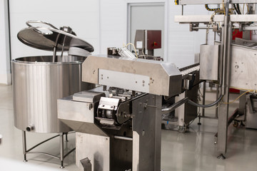 Ice cream production line. Conveyor production. Machine for conveyor line. Selective focus.