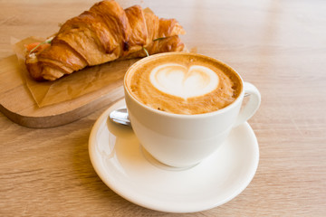 Cappuccino and croissant with a complex filling, Breakfast, lunch