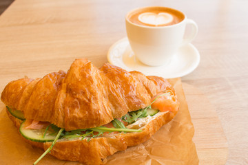 Cappuccino and croissant with a complex filling, Breakfast, lunch