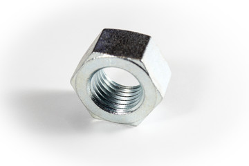 Silver metal nut on a white isolated background