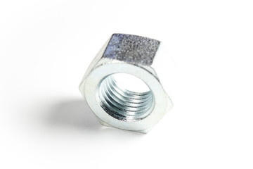 Silver metal nut on a white isolated background