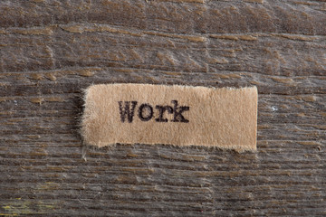 Work word on a piece of paper close up, business creative motivation concept