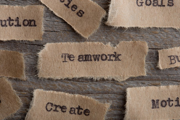 Teamwork word on a piece of paper close up, business creative motivation concept