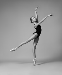 Ballerina posing. Black and white photo.