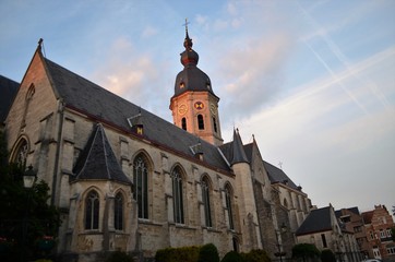 Fototapeta na wymiar A church in a Belgian town at sunset