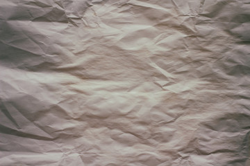 Old crumpled paper texture background.  Creases and cracks. Old design pattern. 