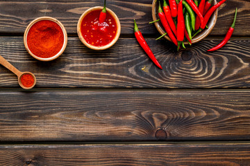 hot chilli pepper pattern on wooden background top view mock up