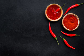 hot chilli pepper pattern on black background top view mock up