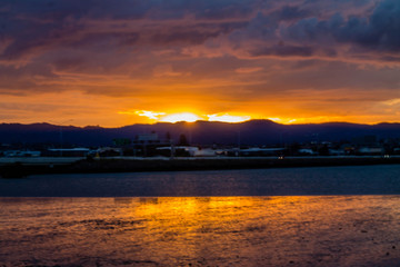 Obraz premium Golden sunsets are the highlight on this beach, Point Chevier, Auckland, New Zealand
