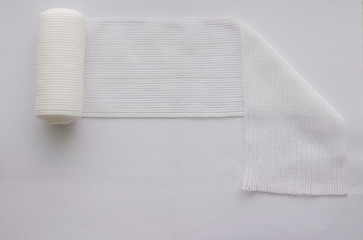 Roll gauze with fold on white background