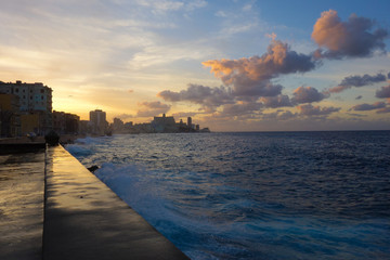 Colroful sunset at Malecon, the famous Havana promenades in Havana, Cuba