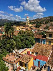 Colorful skyline with mountains and colonial houses. The village is a Unesco World Heritage and major tourist landmark on the Caribbean Island, Trinidad de Cuba