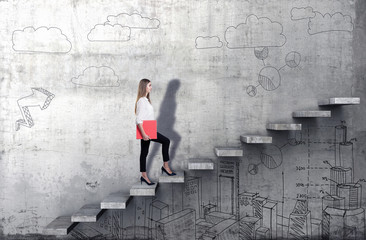 Side view of young businesswoman climbing the stairs with business sketch on concrete background