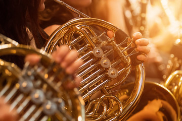 french horn during a classical concert music, close-up.