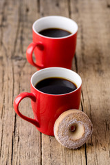 Two Red Cups of Black Coffee and Tasty Homemade Cookies Old Wooden Background Vertical