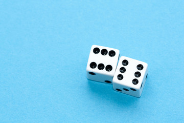 Gaming dices on blue background.