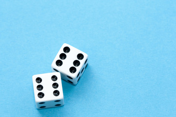 Gaming dices on blue background.