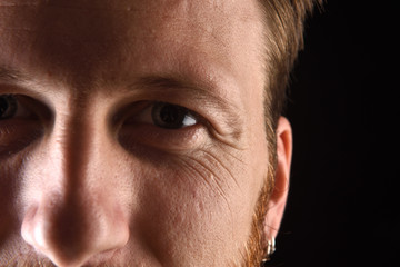 detail of the face of a man in his early thirties