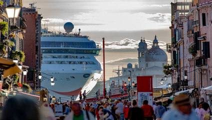 Italy beauty, like a horror movie scene, gigantic cruise ship leaving Venice , Venezia