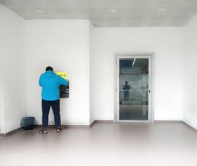 man standing in front of door